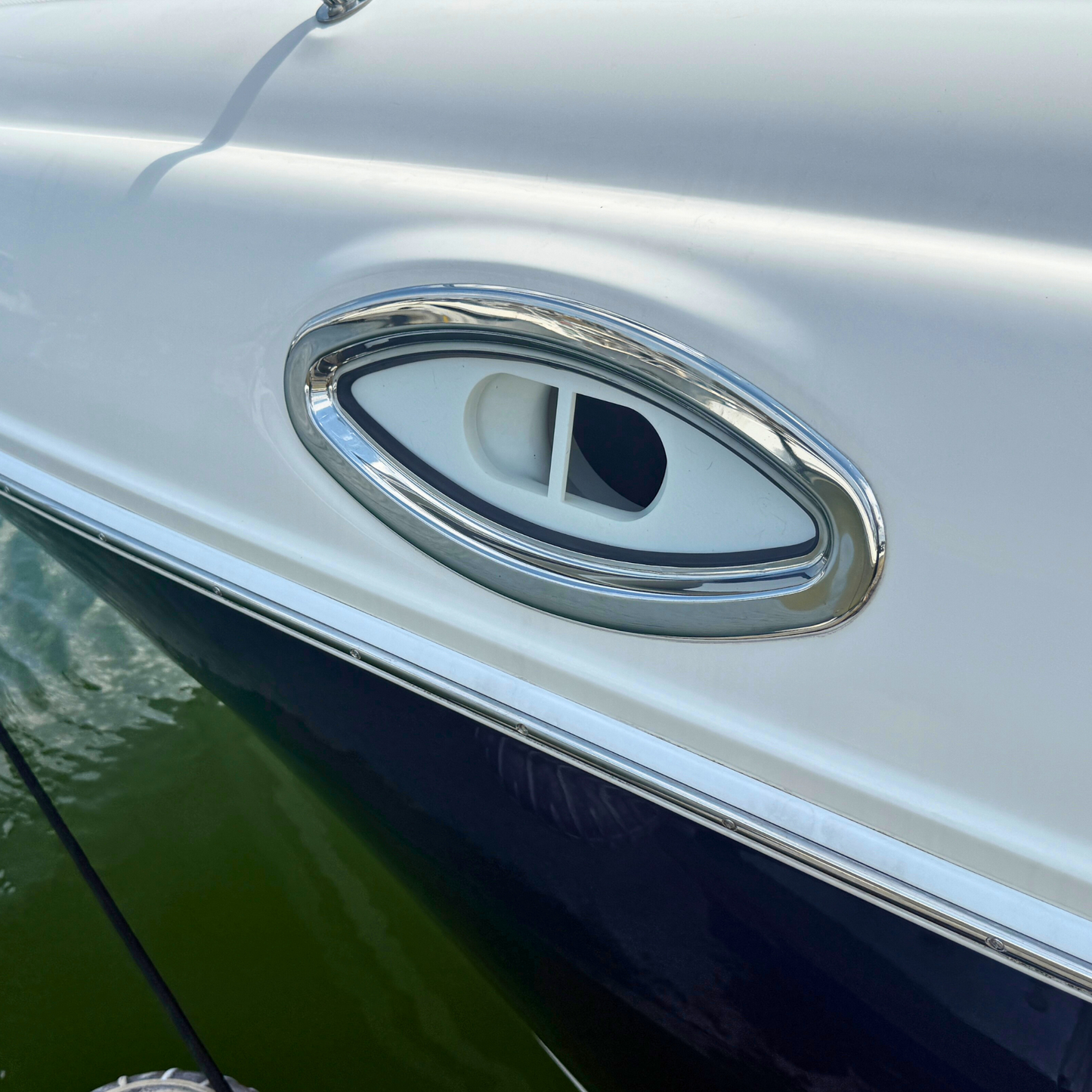 White Plastic Sea Ray AC Mount In Window with AC Hose - External to boat